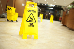 caution lobby mop bucket and sign